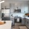 kitchen with an island, modern appliances and spacious counter-space