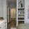 bedroom with a closet, large, spacious areas, and bright lighting from large patio doors